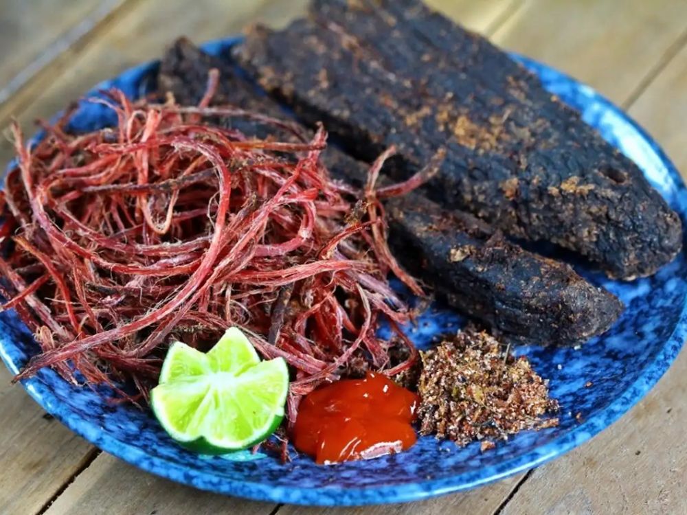 Must-try local foods in Ha Giang_ Thit Trau Gac Bep (Smoked Buffalo Meat)