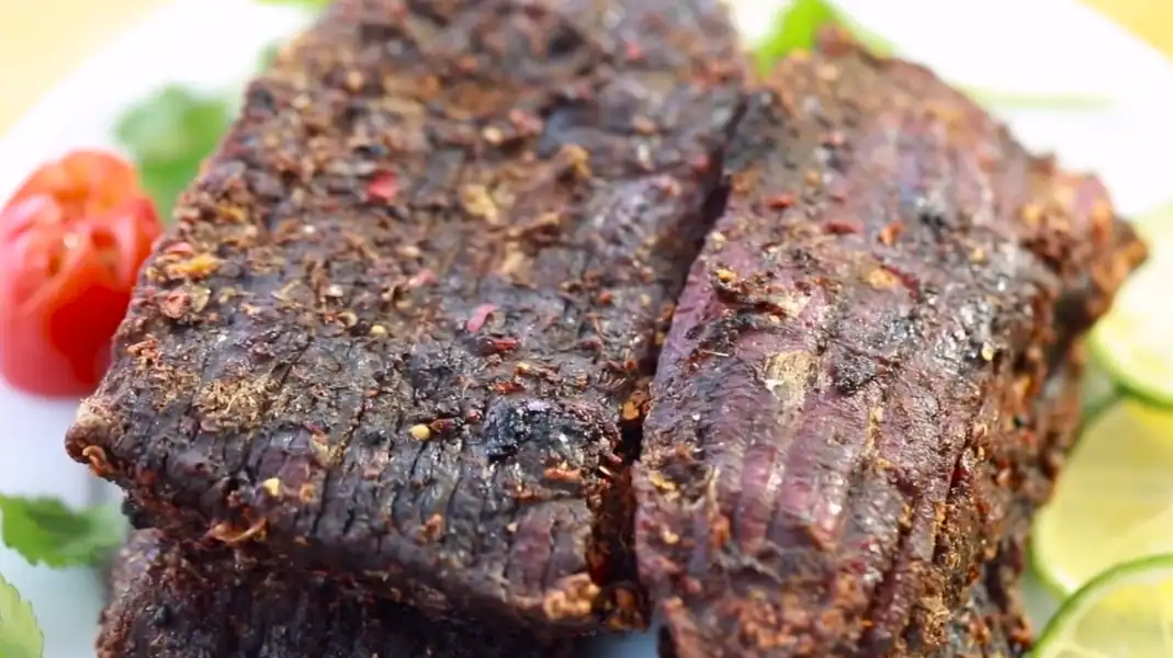 Top 11 Must-Try Local Foods in Ha Giang You Cannot Miss 2026 15 Smoked Buffalo Meat (Thit Trau Gac Bep)