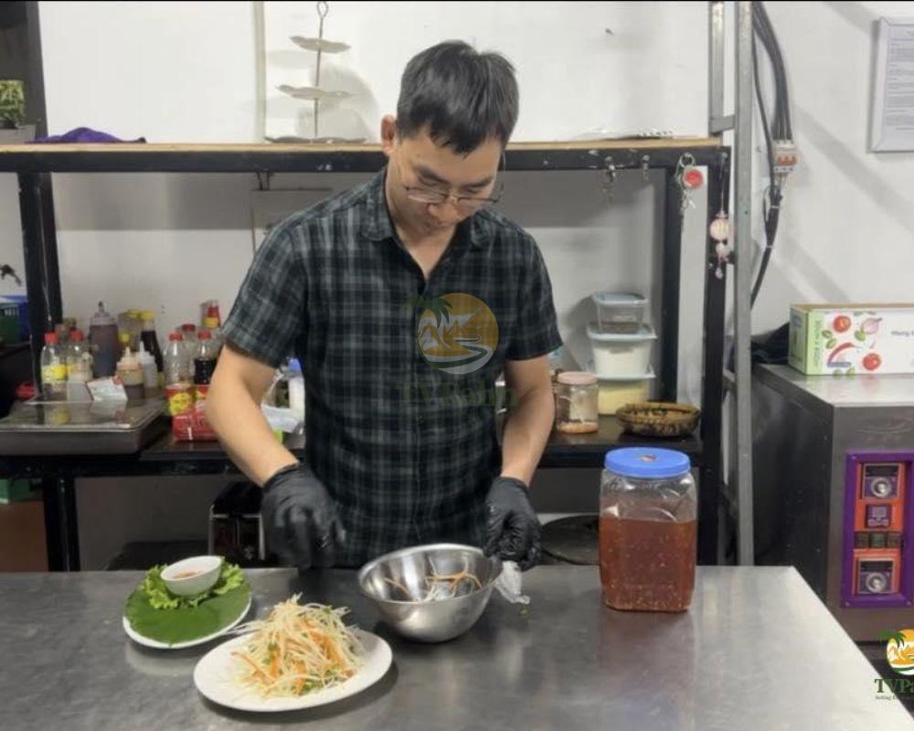 Chef preparing food at The Palm Restaurant