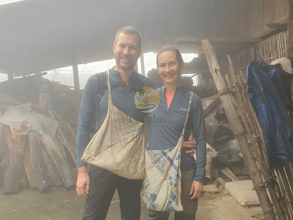 Couple visiting a traditional workshop on 1 day ancient snow shan tea tour