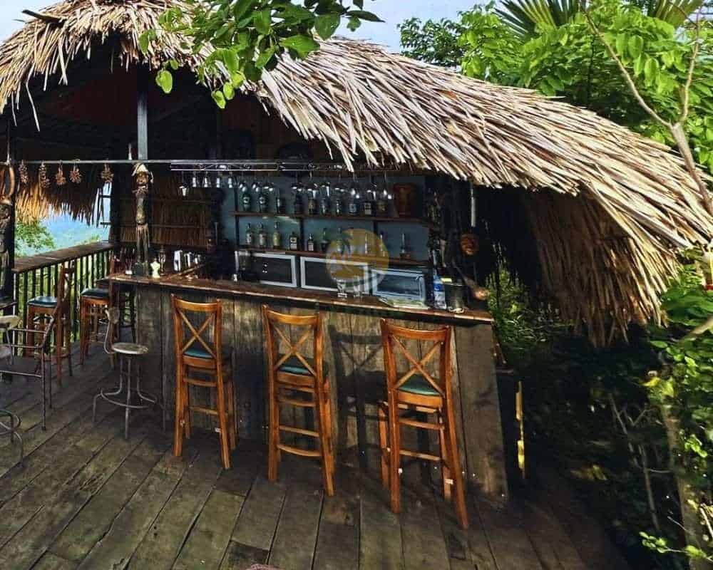 Iconic thatched-roof architecture at The Cloud Bar