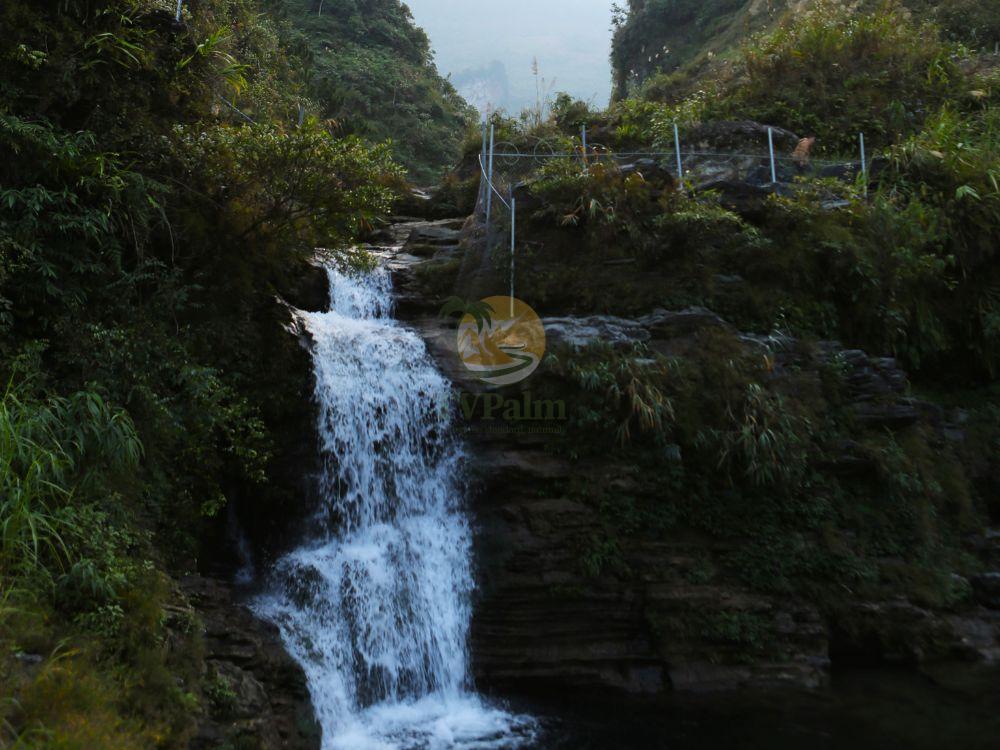 Natural beauty of a waterfall on a Ha Giang Loop tour 4 days