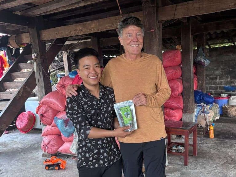 Proudly holding a pack of finished 1 day ancient snow shan tea