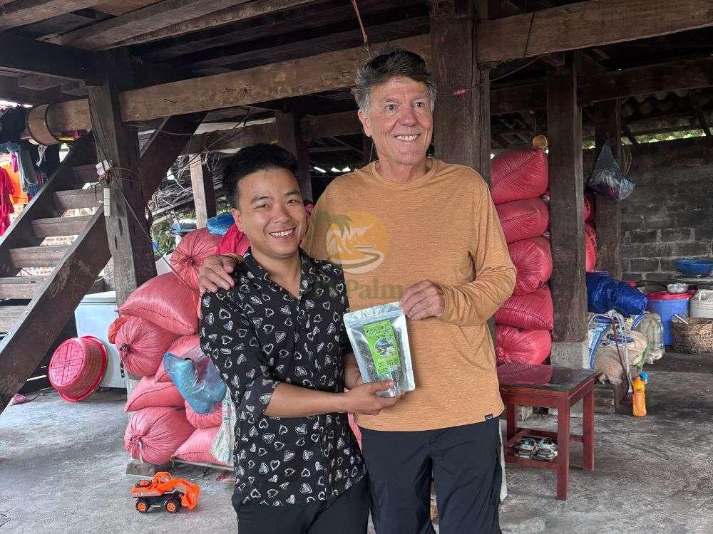 Proudly holding a pack of finished 1 day ancient snow shan tea