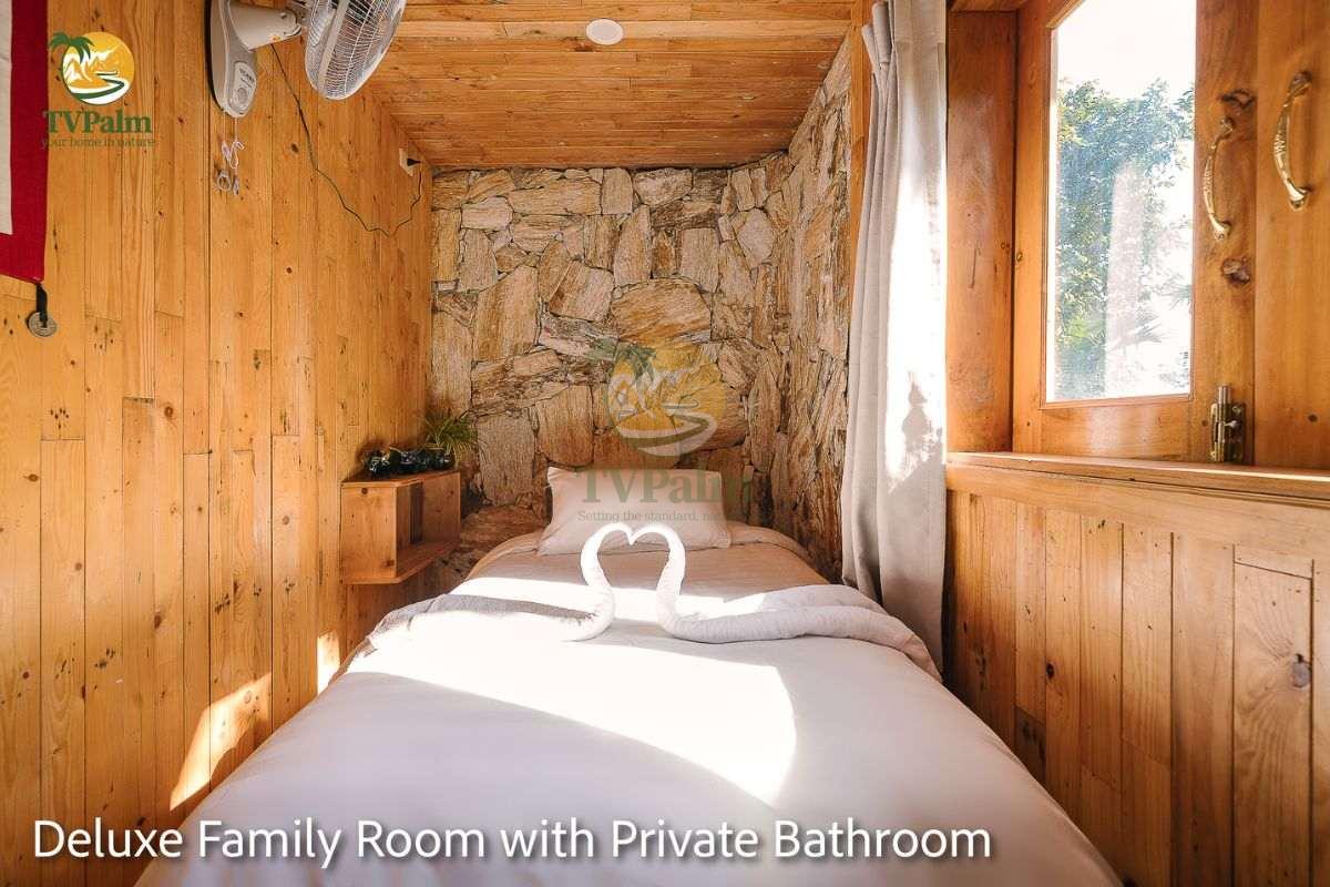 deluxe family room single bed stone wall