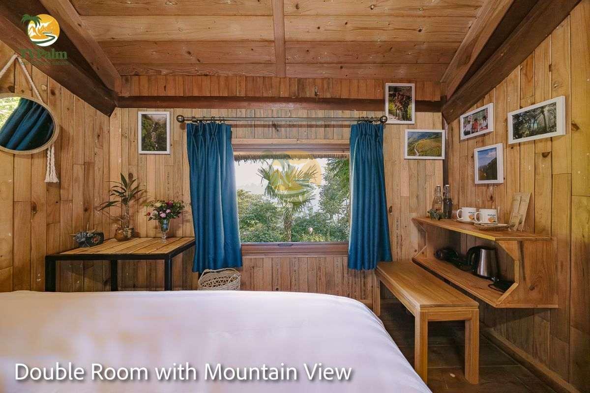 double room with mountain view bedroom overview