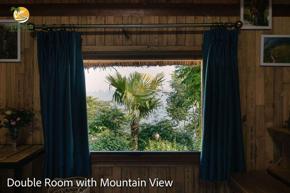 double room with mountain view large window