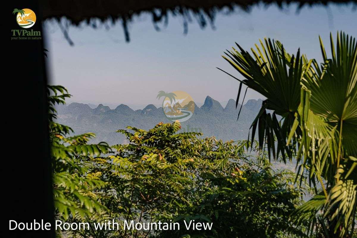 double room with mountain view window scenery