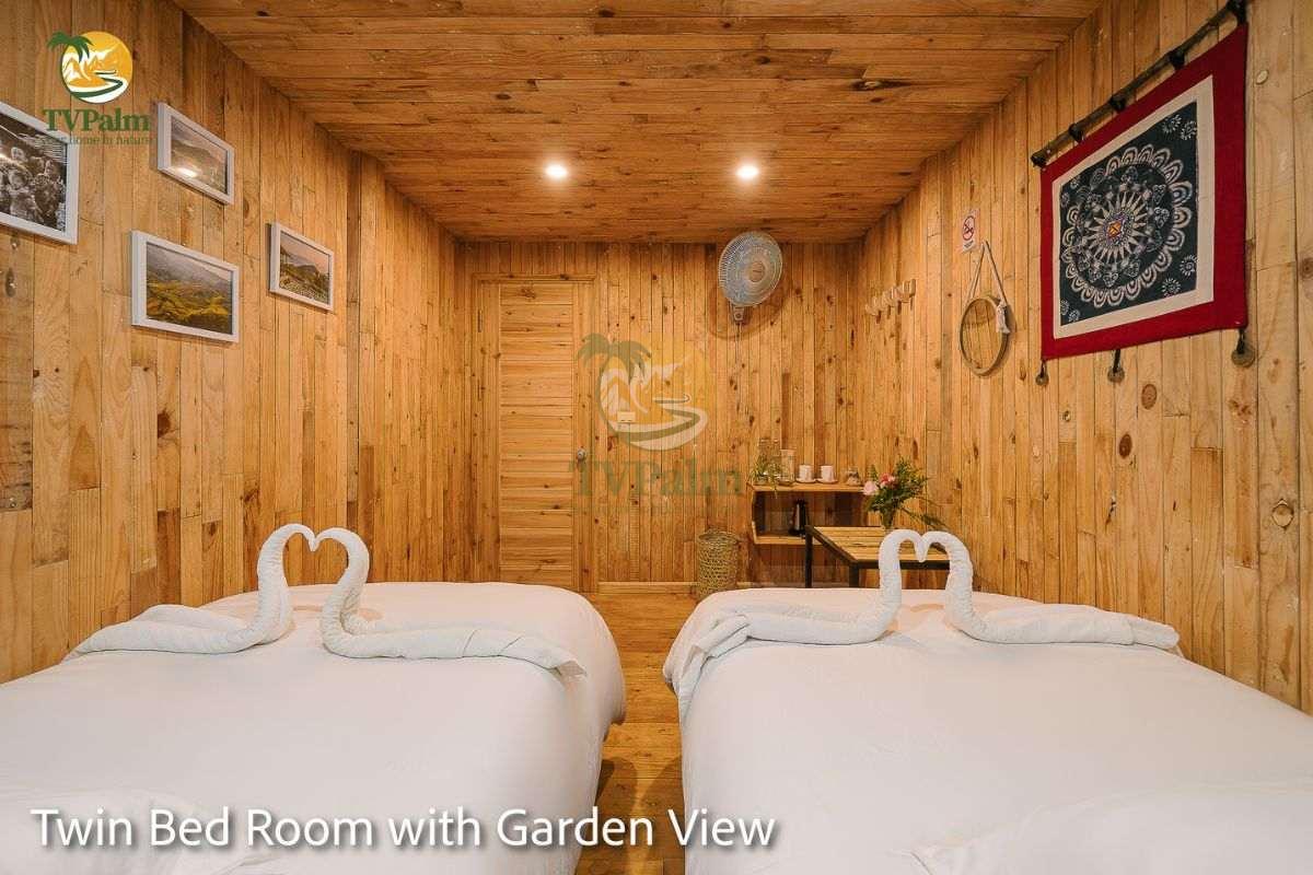 modern twin room at tvpalm with garden view
