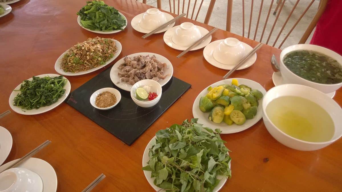 Highland ethnic market food stall serving traditional local dishes in Ha Giang